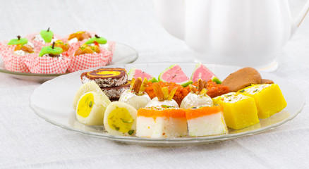 Indian Traditional Mix Sweet Food or Mix Mithai include Peda, Mawa Burfi, Dry Fruits Sweet, Halwa or Coconut Burfi