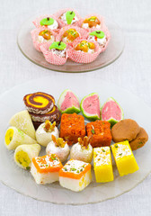 Indian Traditional Mix Sweet Food or Mix Mithai include Peda, Mawa Burfi, Dry Fruits Sweet, Halwa or Coconut Burfi