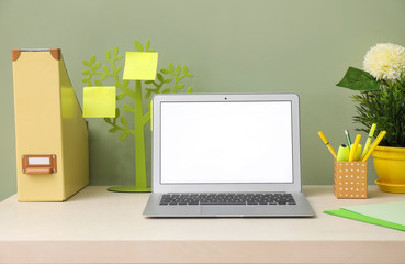 Comfortable workplace with modern laptop