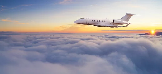 Selbstklebende Fototapeten Luxury private jetliner flying above clouds. © Jag_cz
