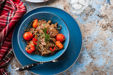 Soba noodles with beef, mushrooms, cherry tomato and sweet peppers