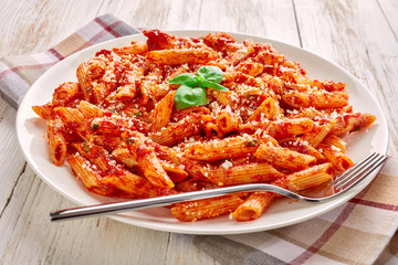 close-up of a portion of penne arrabiata