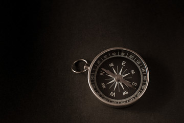 Closeup shot of a metalic compass © krash20