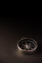 Closeup shot of a metalic compass