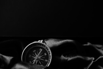 Closeup shot of a metalic compass © krash20