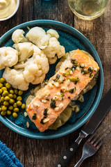 Solomon fillet with pineapple and cauliflower. Fish with vegetables.