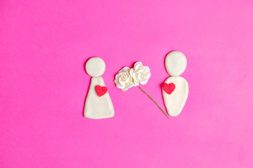 Pair of love, Valentines day, red hearts, white flower and cute couple cartoon in love together on pink background with copy space