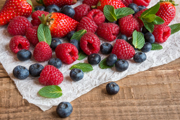 Fresh fruit salad on wooden table