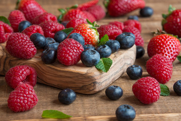 Fresh fruit salad on wooden table