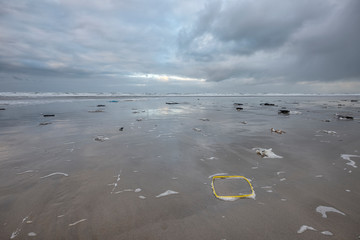 Environmental damage on island Terschelling the Netherlands containers in ocean