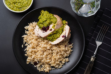 Sliced Chicken Roll with Cranberries, Pesto and Rice.