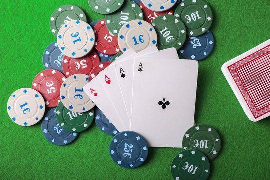 Chips and cards on table in casino