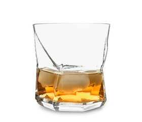 Glass of whiskey on white background