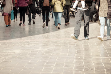Walking through the street crowd. A crowd of pedestrians crossing street in the city, People walking in the street. Big city life. Crowd walking - group of people walking together (motion blur)