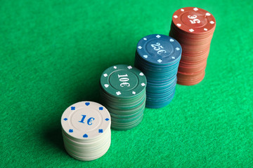 Chips for poker game on table in casino