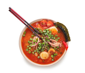 Tasty Chinese soup in bowl on white background