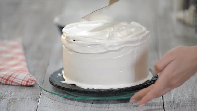 Decorating cake with cream.Culinary master class design cakes,Cream cake for a holiday.