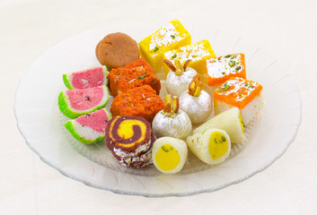Indian Traditional Mix Sweet Food or Mix Mithai include Peda, Mawa Burfi, Dry Fruits Sweet, Halwa or Coconut Burfi