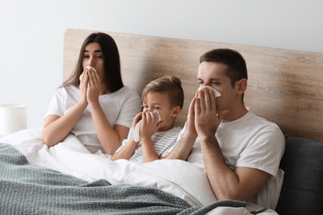 Obraz na płótnie Canvas Family ill with flu at home