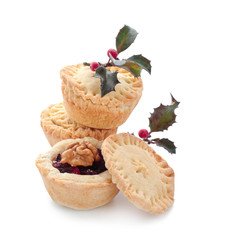 Tasty mince pies on white background