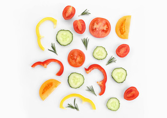 Cut vegetables on white background, flat lay