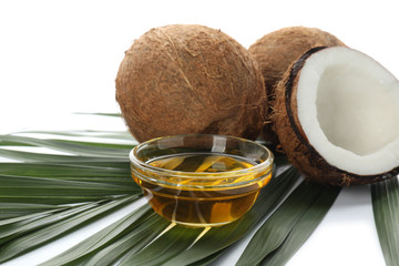 Composition with coconut oil on white background