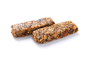 Tasty granola bars on white background