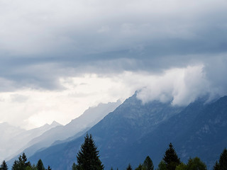 Mountain range with stormy clouds above