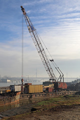Fototapeta na wymiar Crane at Barge Construction