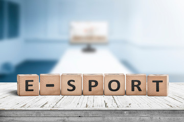 E-sport sign on a desk in a blue room