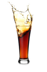 Glass of tasty soda with splash on white background