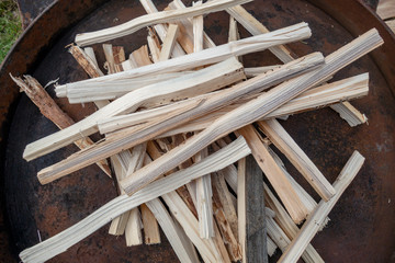Pile of small wooden stick prepared for camp fire