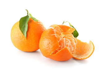 Tasty juicy tangerines on white background