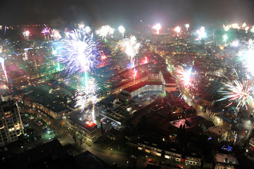 Fireworks on new years eve as seen from a 101 meters high building in the center of Enschede in the Netherlands