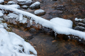 forest river in winter. Amata in Latvia
