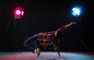 Young woman dancing in club