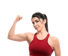 Fototapeta na wymiar Sporty muscular woman on white background