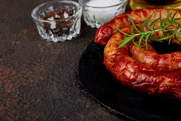 Grilled or Roasted spiral pork sausages with rosemary,