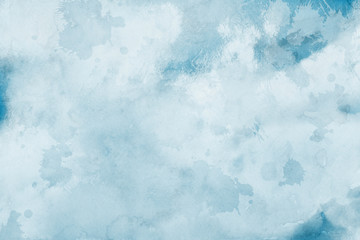 Colorful winter blue ink and watercolor textures on white paper background. Paint leaks and ombre effects. Hand painted abstract image.