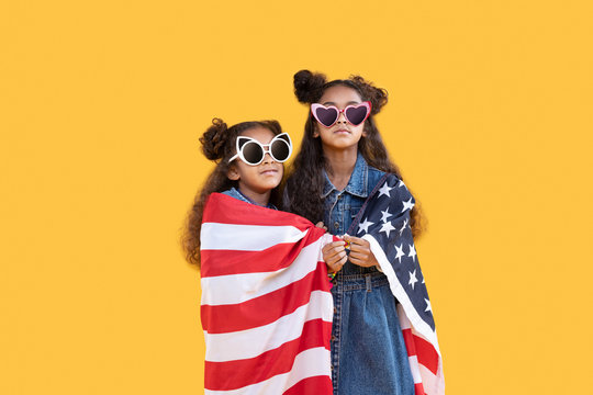 Serious pretty girls celebrating the Independence day