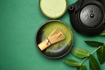 Composition with matcha tea on color background