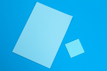 mock up concept. cards Papers on blue  background. Top view, flat lay, copy space