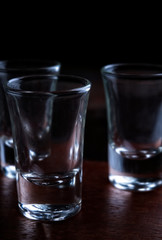Shot glasses on the wooden tray