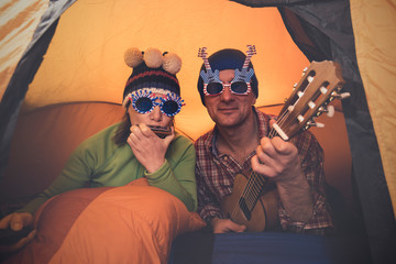 Joyful hipsters couple in travel