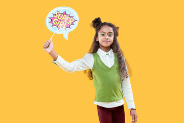 Nice pretty girl holding a painted sign