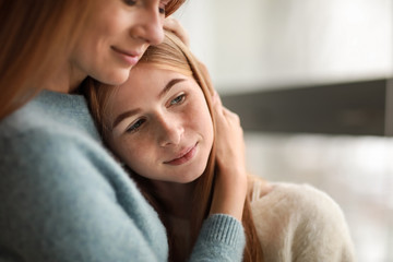 Portrait of happy mother with daughter