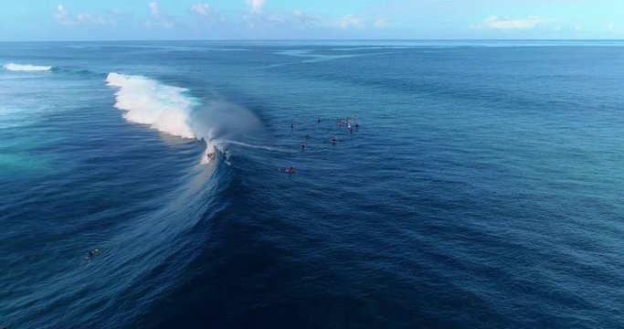 surfing in aerial view, teahupoo papeete french polynesia