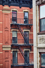 Fototapeta premium Red building fire escape stairs