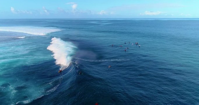 surfing in aerial view, teahupoo papeete french polynesia