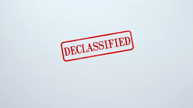 Declassified seal stamped on blank paper background, free access, publicity